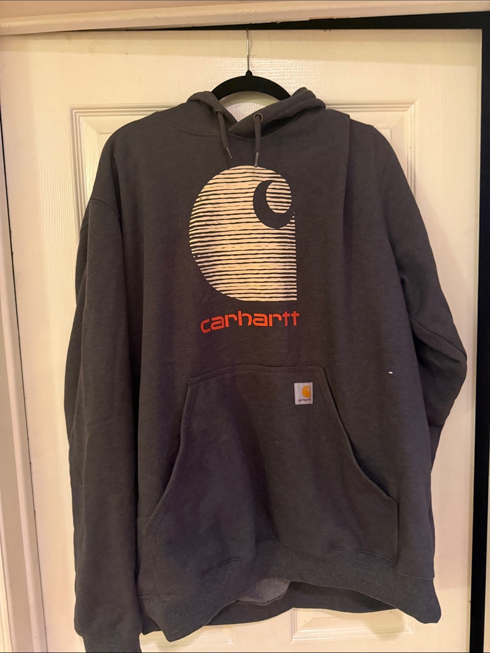 Carhartt Men’s Charcoal Hoodie with Cream Graphic and Orange Logo